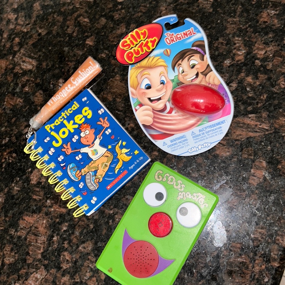 Stocking stuffers Practical Joke guide book, battery operated joker, silly putty